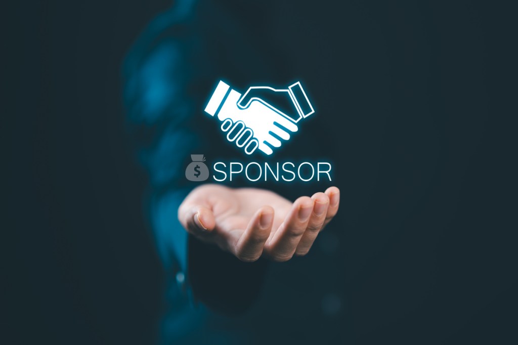 sponsorship concept showing sponsor icon with handshake on a virtual screen