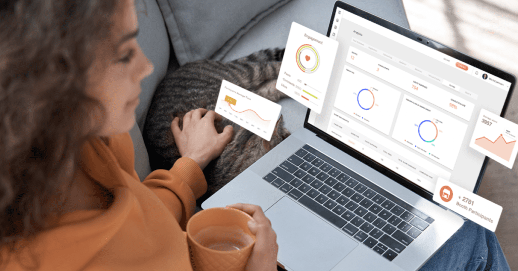An event professional reviews event data from her analytics dashboard on her laptop computer.