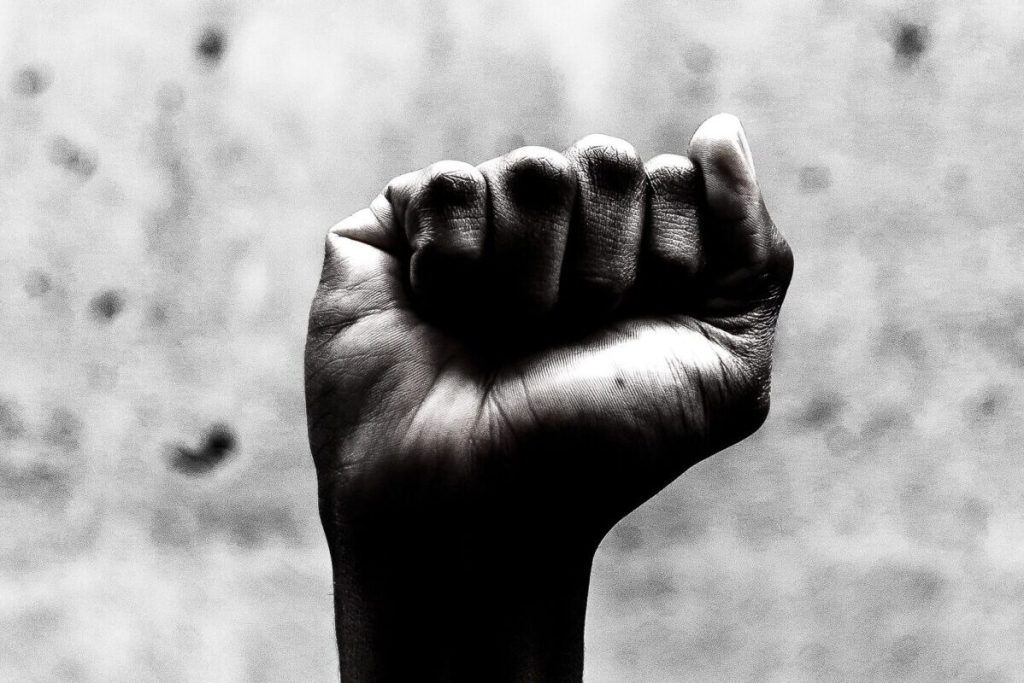 Fist in air