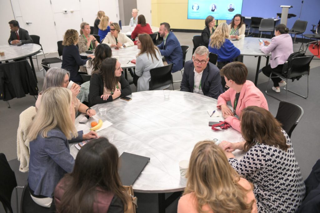 People sitting around a conference table