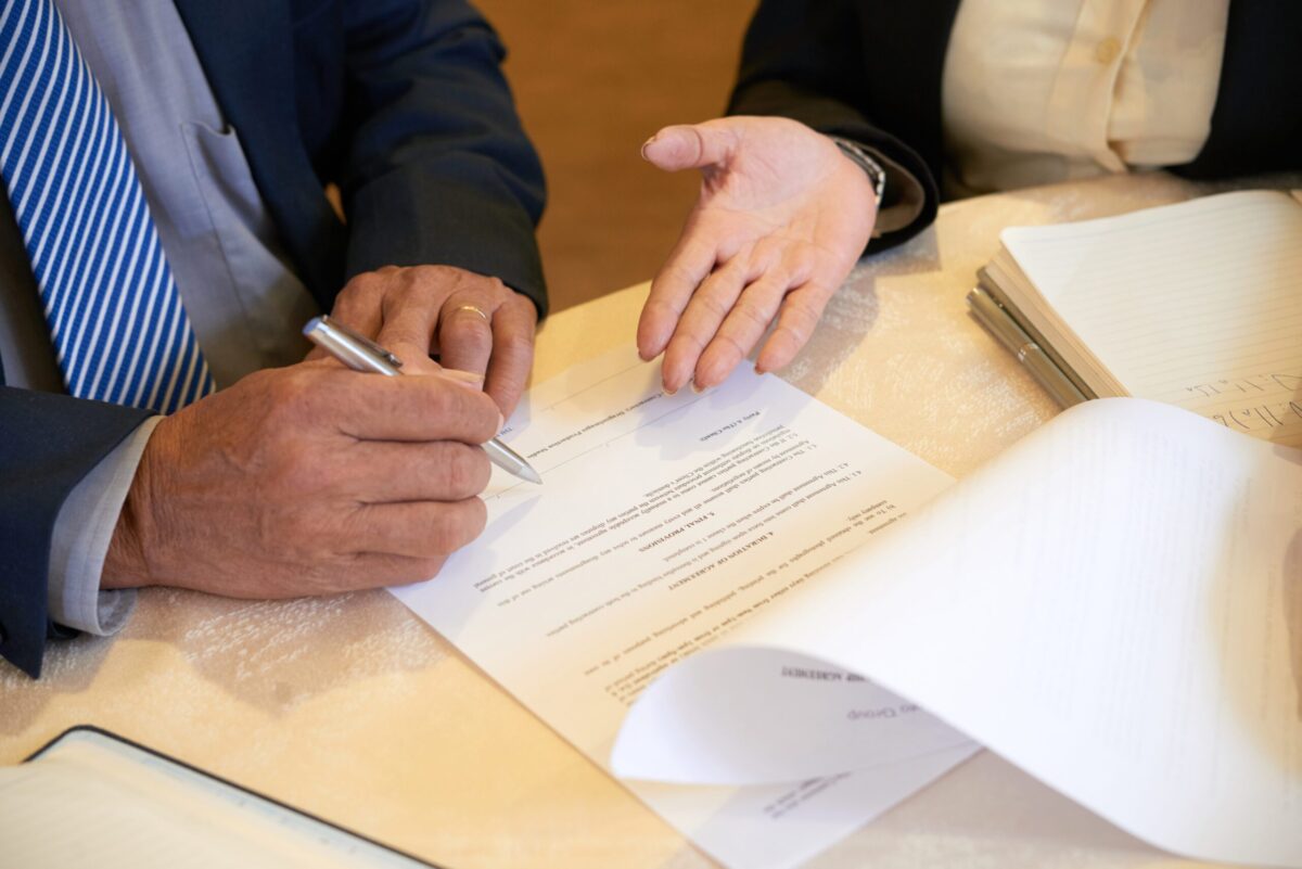 Two execs sign contract from associations