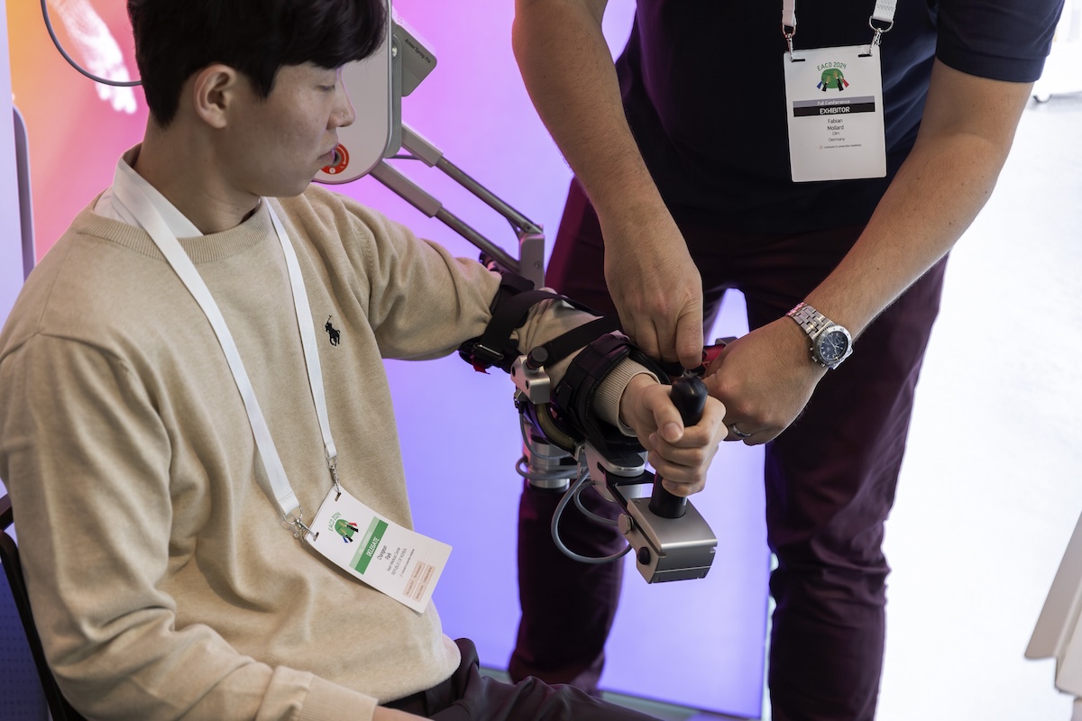 Person trying out a rehabilitation aid