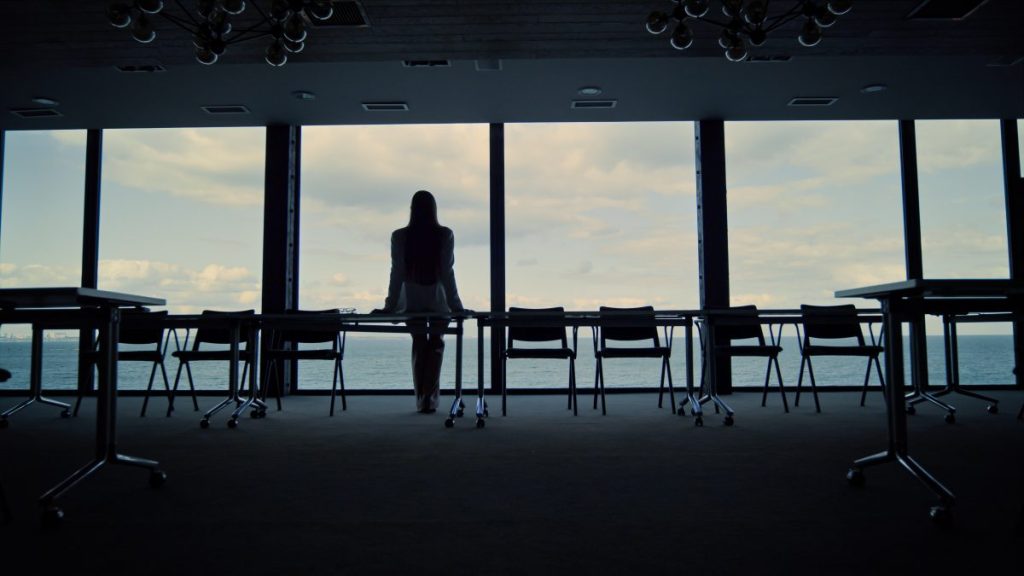 Business woman in an empty conference room