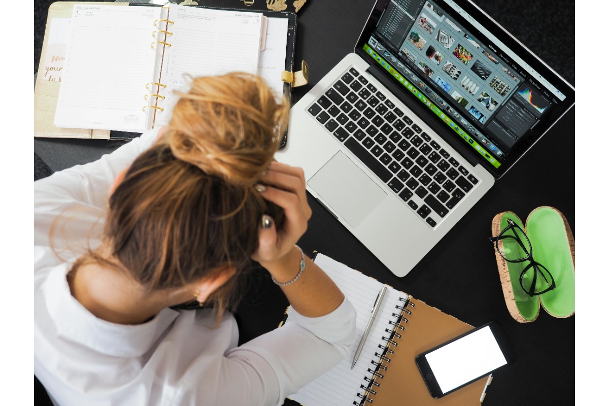 woman at computer stressed out